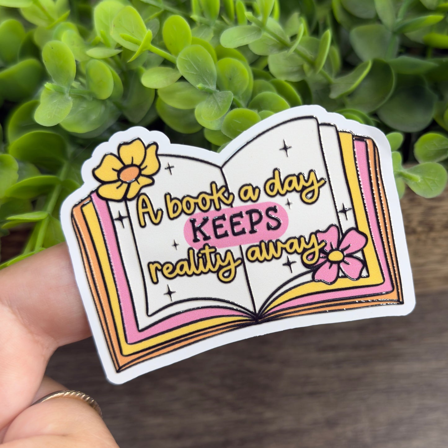 A Book A Day Keeps Reality Away Textured White Vinyl Sticker 3"